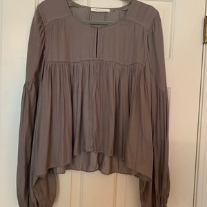 Silver balloon sleeved peplum blouse